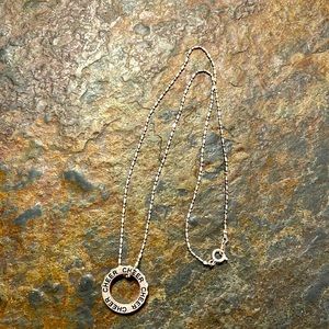 16” sterling chain with a cheer ring pendant with rhinestones in outer circle.